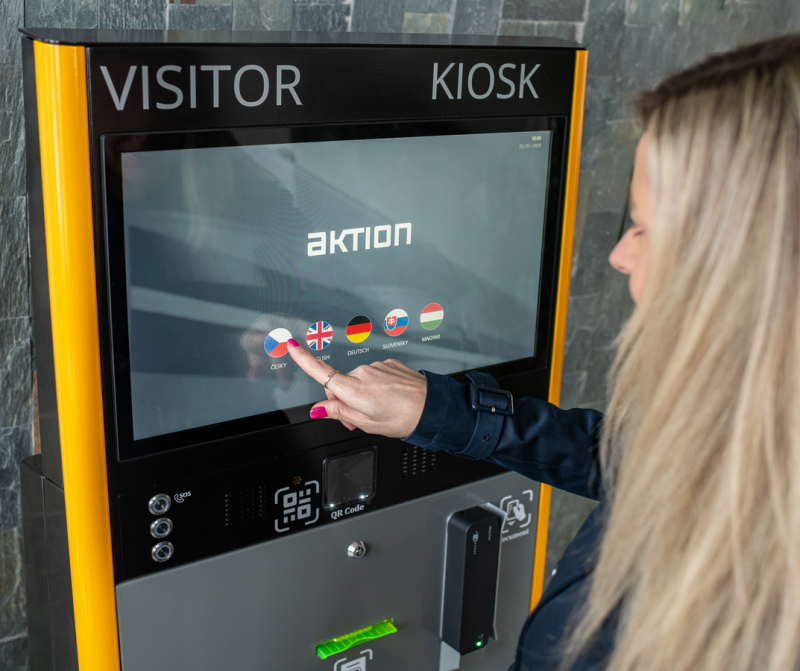 a woman touching a screen